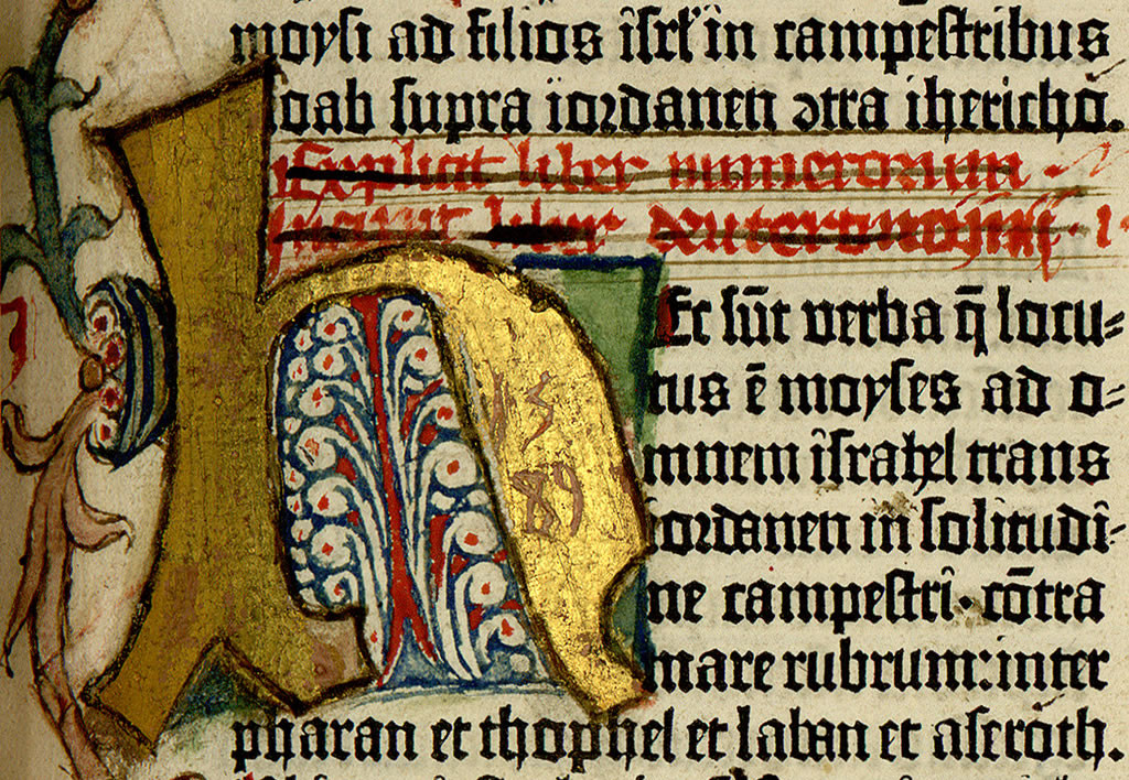 Latin manuscript with rubrication and struck-through lines — church print gatekeeping (Gutenberg-era Bible page)